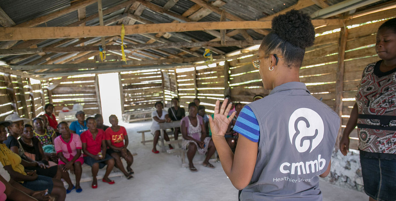 A member of CMMB speaks to a group of women enrolled in our programming.